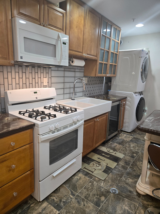 Kitchen with microwave - Fully Furnished -  Private clean 1 bedroom (Washer/Dryer) House