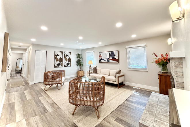 living room (staged photo, does not come furnished) - Brand New Remodeled 2 bedroom/2 Bathroom - 4885 Eisenhower Drive Apartments