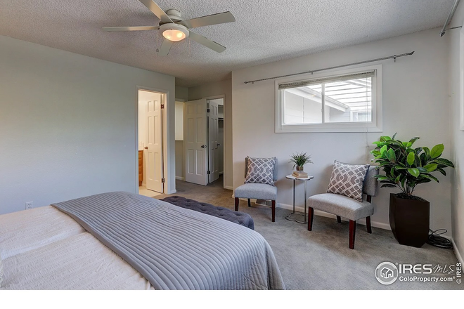 showing door to walk in closet - Townhouse near trails, easy access to campus, 1 room available now!