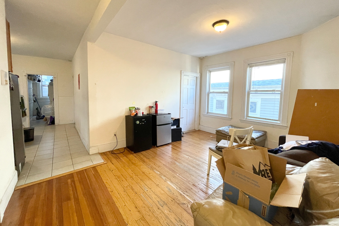 Living Room - ROOM RENTAL - Large 4 Bedroom in Mission Hill! Stainless steel appliances and Laundry Apartments