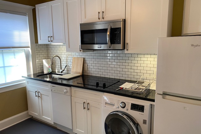 Full kitchen with totally new appliances: stove/oven, dishwasher, frig & freezer, clothes washer & dryer. - $1800 Perfect Studio in Floral Park with 4-Block Walk to L.I. Railroad Townhome