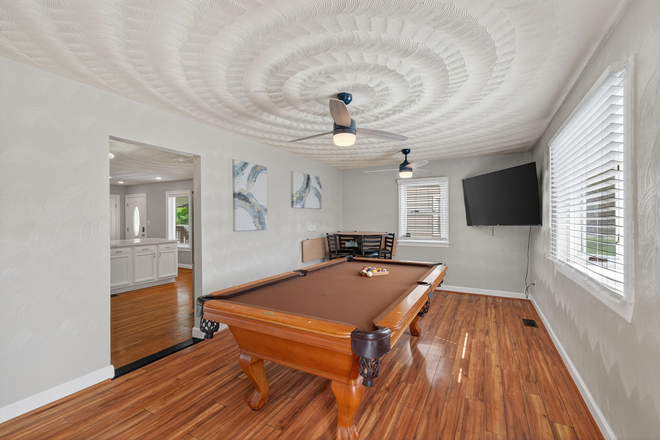 1st Floor ~ Shared Game Room with Pool Table, Smart TV, and Table/Chairs - Unit 3 ~ 1st Floor Private Bedroom, centralized location to campus, shopping, dining House