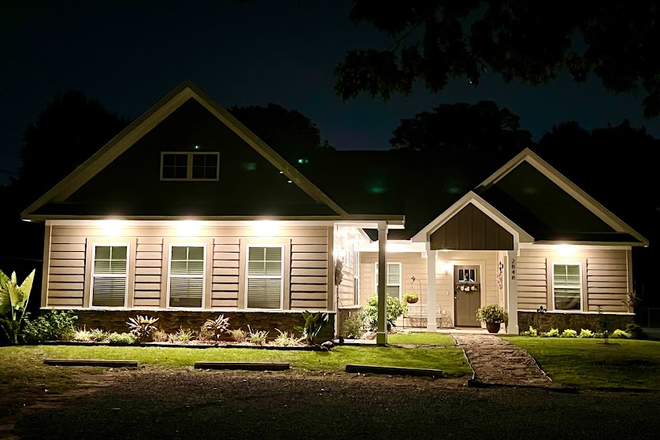 Exterior at dusk with plenty of lighting in a safe neighborhood with easy access to the interstate - The Guest Pass, Your Private Pad! Fully Furnished, Utilities Included Apartments