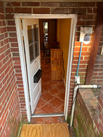 Private entrance from the backyard of the house - Walkable Studio in University Park Apartments