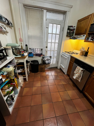 Kitchen with dishwasher and porch - AVAILABLE 11/1 Cleveland Circle, Heat & Hot Water Included, Easy Access to B, C, and D Line T