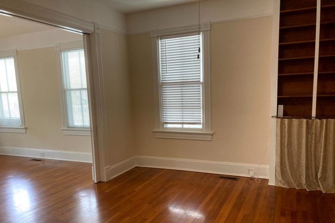View of back room (bedroom and kitchen area) from door to bathroom. - Nice, 1 bedroom studio apartment on neighborhood street a block from MUSC