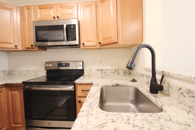 Kitchen - 4 bedroom - 2 bath condo for rent!