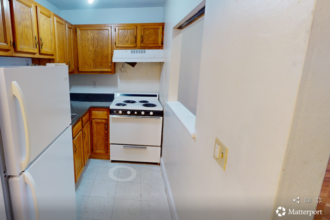 Visit hubrealtyproperties.com - Large 2 bedroom 2 bathroom, in exceptional building, one block from the green line T