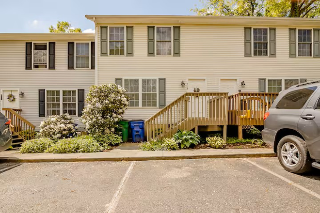 Outside photo of townhouse with parking for two cars - Fully furnished townhouse convenient to VT, Christainsburg shopping & restaurants, available 6/20