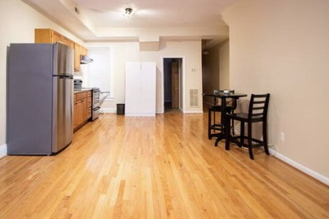 Kitchen and Dining Space - Bright & Charming Top-Floor 2BR Apartment Near Howard, Catholic & NoMa (Eckington-NE DC)