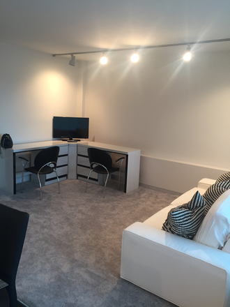 Living room - Tower Plaza , central campus , furnished, large corner unit, 1bd 1ba, view of campus Condo