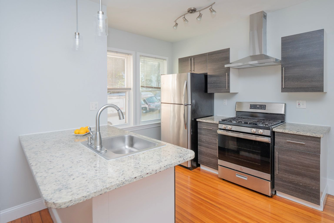 Kitchen - Great location! Updated 2 bedroom PLUS Office 1 Bathroom w/ Off Street Parking! Apartments