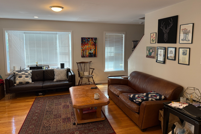 Living Room - Furnished Room and Private Bathroom, 15-Min Walk from Campus Apartments