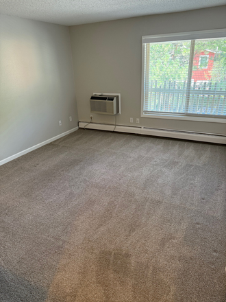 Living Room, no furniture **BRAND NEW A/C UNIT** - Boulder Condo / West Facing Mountain Views / Close to Campus