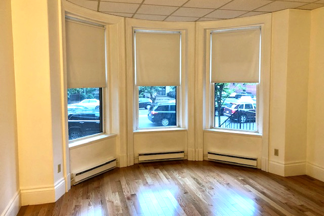 visit hubrealtyproperties.com - Beautiful brownstone on south campus, sunny studio with bay windows