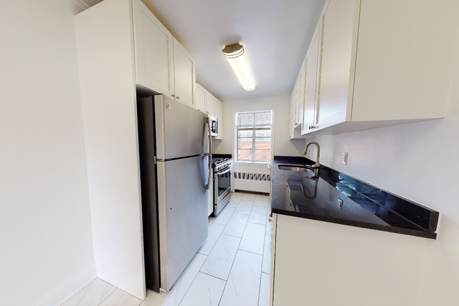Visit hubrealtyproperties.com - Fantastic 1 bedroom with renovated kitchen, close to Coolidge Corner and T Apartments