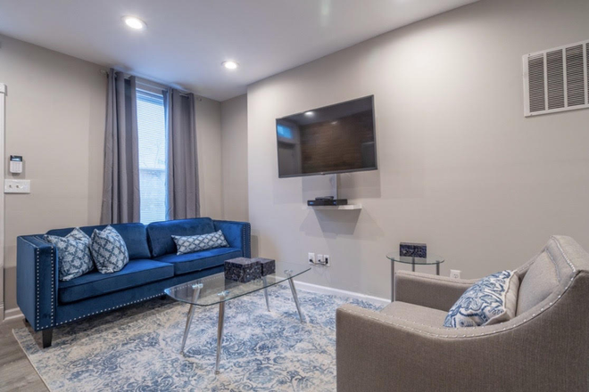 Living room - additional view - Fully Furnished Row Home Near Johns Hopkins