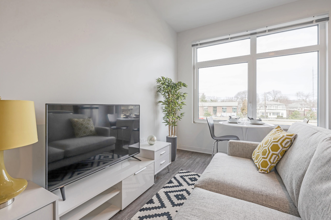 living room - TWO MONTHS FREE! 3Bed/2Bath Near Campus! UTILITIES INCLUDED! LAUNDRY IN UNIT! Apartments