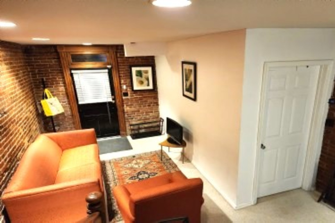 Living Area - DUPONT: Furnished Basement Apt, THREE short blocks to metro & GU shuttle