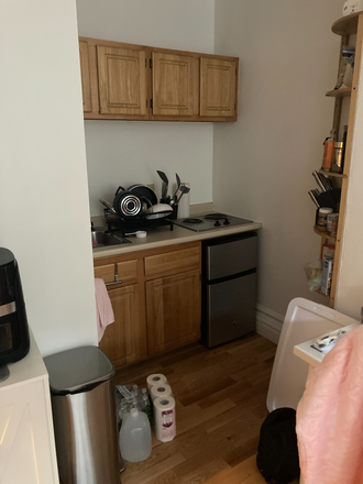 Visit hubrealtyproperties.com - Front facing studio with new hardwood floors and freshly painted, near Charles River Apartments