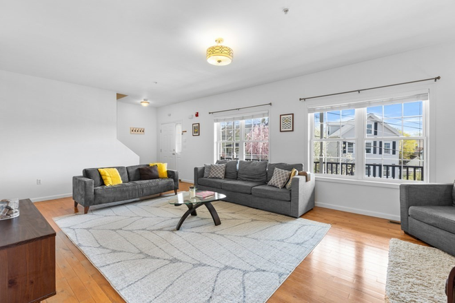 Living room - Spacious townhouse in East Somerville near bike path and MIT