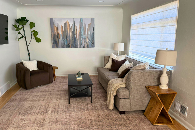 Living room - 3BR Fully Furnished Home Near DU and Wash Park
