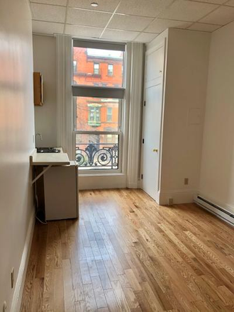Visit hubrealtyproperties.com - Studio, currently being painted with new hardwood floors