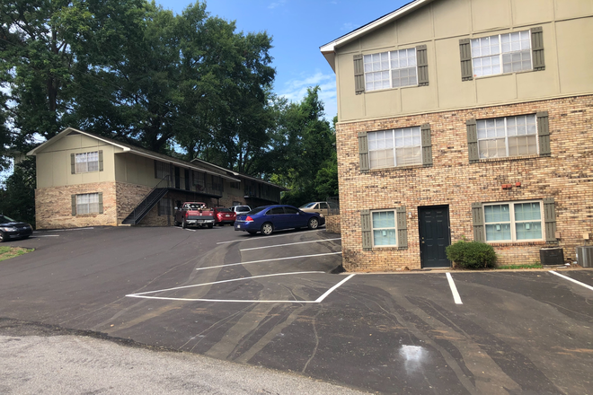 View from Street  Newly paved parking lot - Rivercliff Apartments