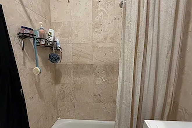 Shower - NO FEE Symphony area studio for 9/1 start. $2,460/mo. Great location near schools and hospitals. Apartments