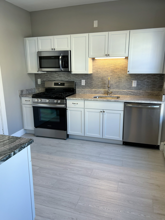 x - NEWLY RENOVATED 4 BED 2 BATH - 1 PARKING INCLUDED - LAUNDRY IN UNIT Apartments