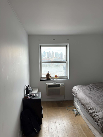 Bedroom picture furnished - Highrise Chinatown Apartment next to F train, 15th Floor with balcony and view over river
