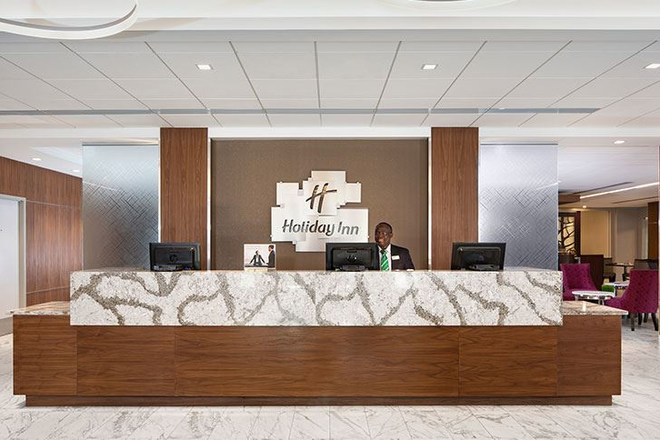 Reception counter - Holiday Inn College Park - 2 miles from the UMD campus Apartments