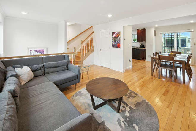 Living Room + Dining Room - Furnished Basement w/ Utilities Included Townhome