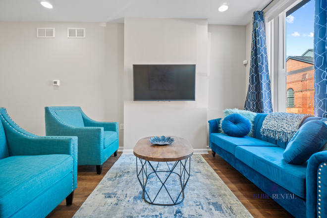 Living Room - Your Home Away From Home Walking Distance to Hopkins w/Parking