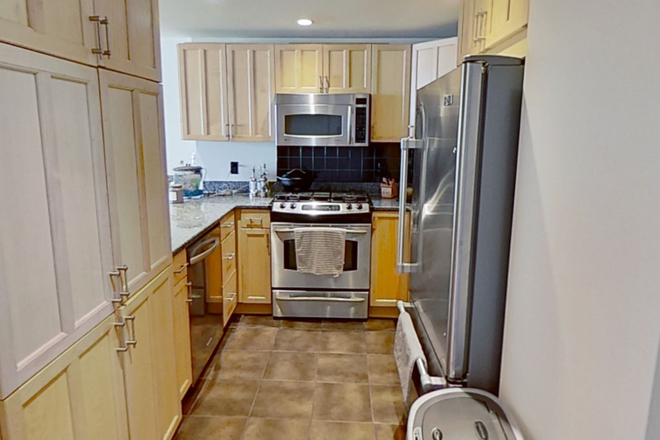 Kitchen - Bright & Spacious Midtown Condo – Heat, Gas, and Hot Water Included!