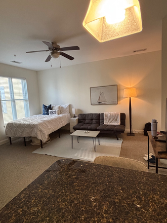 Living/bedroom - Oaks on the Square Studio Apartment