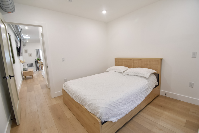 Bedroom 2 (Queen Bed) - The Boho Spruce Suite - Near Hospitals & Center City Duplex