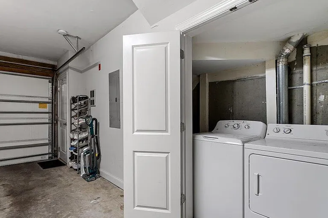 Garage View (With the laundry machines) - Spring 2027 Sublease, 400 W Rosemary Neighborhood, Spacious Private Bed + Bath Condo