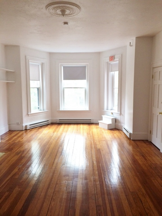 LIVING ROOM - OPEN CONCEPT ONE BEDROOM APT WITH HARDWOOD FLOORS AT 1077 BEACON STREET IN BROOKLINE AVAIL. 9/1/2026