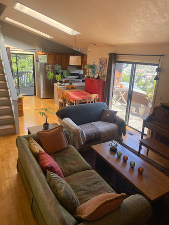 Living Room - Lovely bedroom with renovated private bathroom in quiet neighborhood