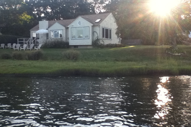 view from the river  of this home! - Waterfront vacation home on Narrow River kayaks, SUPs - 6 month lease
