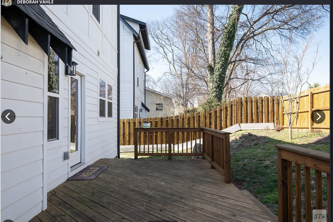 Back of house/deck - 3 BR, 2.5 bath. Attached garage. Walk to local coffee shops and restaurants 3 miles from Vanderbilt House