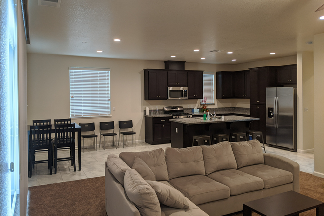 Kitchen and Living Room (share command area) - Single family house, one rooms available for rent. $570 per room include utilities and internet.