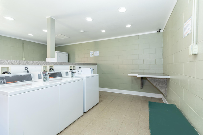 Laundry room - Mayfair Village Apartments