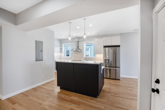 kitchen - Gut renovated 4 bed/3 bath with in unit laundry and deck - NO FEE! Apartments
