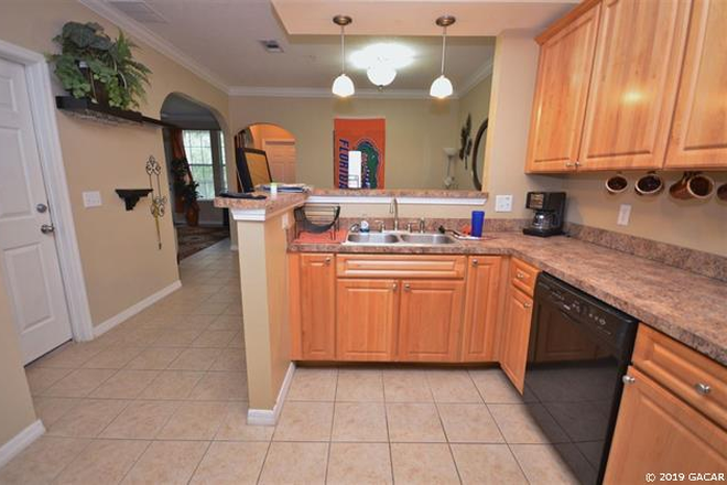 Kitchen - Campus View-Luxury Condo Walking Distance to UF, Shands, and  Sorority Row! 1/2 OFF 1ST MONTH RENT!!