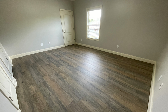 Bedroom, empty - West Glenn Unit, 1 Bed/1 Bath - 12-Month Lease Apartments