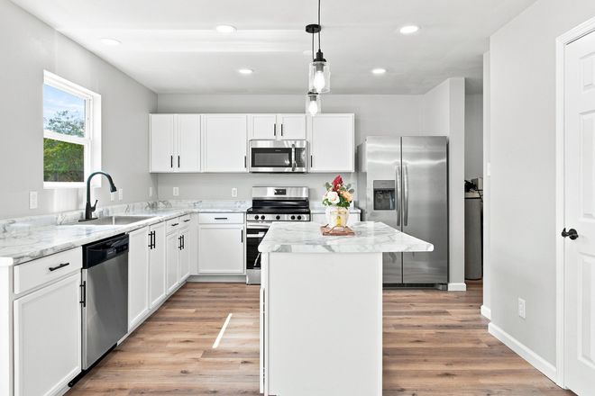 Kitchen - ✨ Extensively Renovated 4-Bedroom Home – Modern Upgrades & Privacy-Fenced Yard! ✨