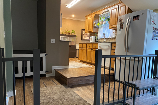 Entry downstairs and kitchen - Downstairs private suite House