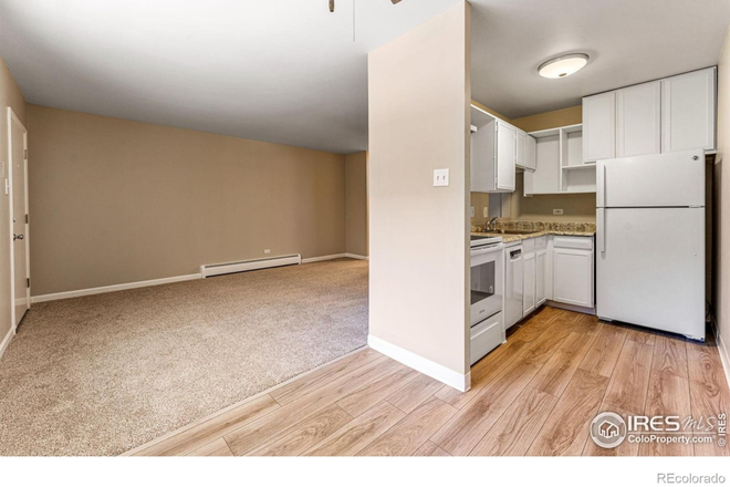 Updated kitchen and dining area - Tired of roomates? Updated one bedroom condo, 1/2 block to campus, mountain views!